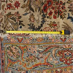 Persian pictorial Kashan rug, ivory field woven with a central tree of life surrounded by flowering plants, birds, and animals, enclosed by a broad turquoise border with scrolling foliage and palmettes