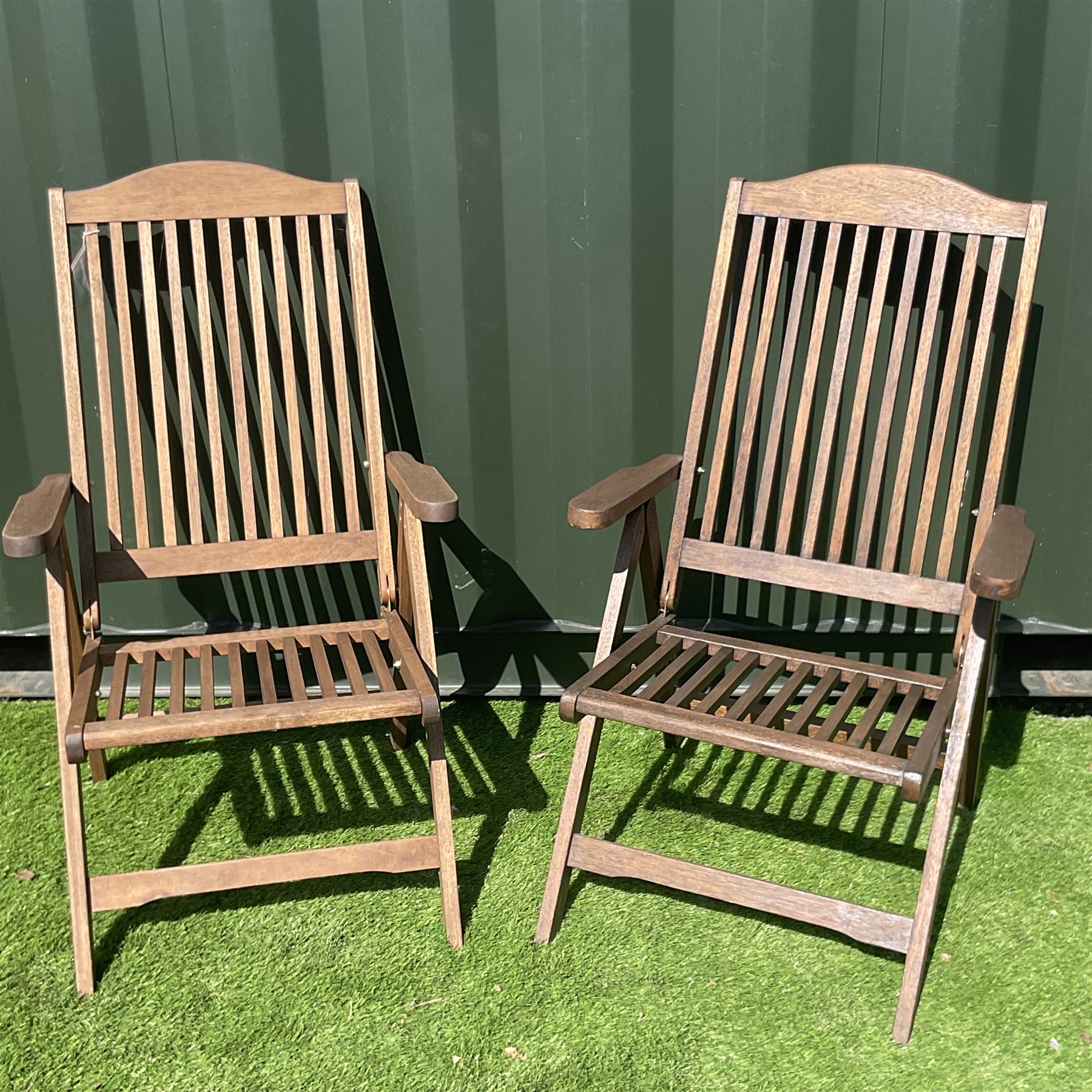 Pair of hardwood folding garden chairs THIS LOT IS TO BE COLLECTED BY