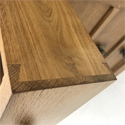 'Lizardman' oak kneehole desk fitted with six drawers and two glazed bookcases, by Derek Slater of Crayke, W347cm, H72cm, D61cm