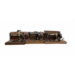 Jones Family C.S. sewing machine no. 21128 in case, together with two Singer sewing models no. 13708872 & F260517 machines in cases (3)