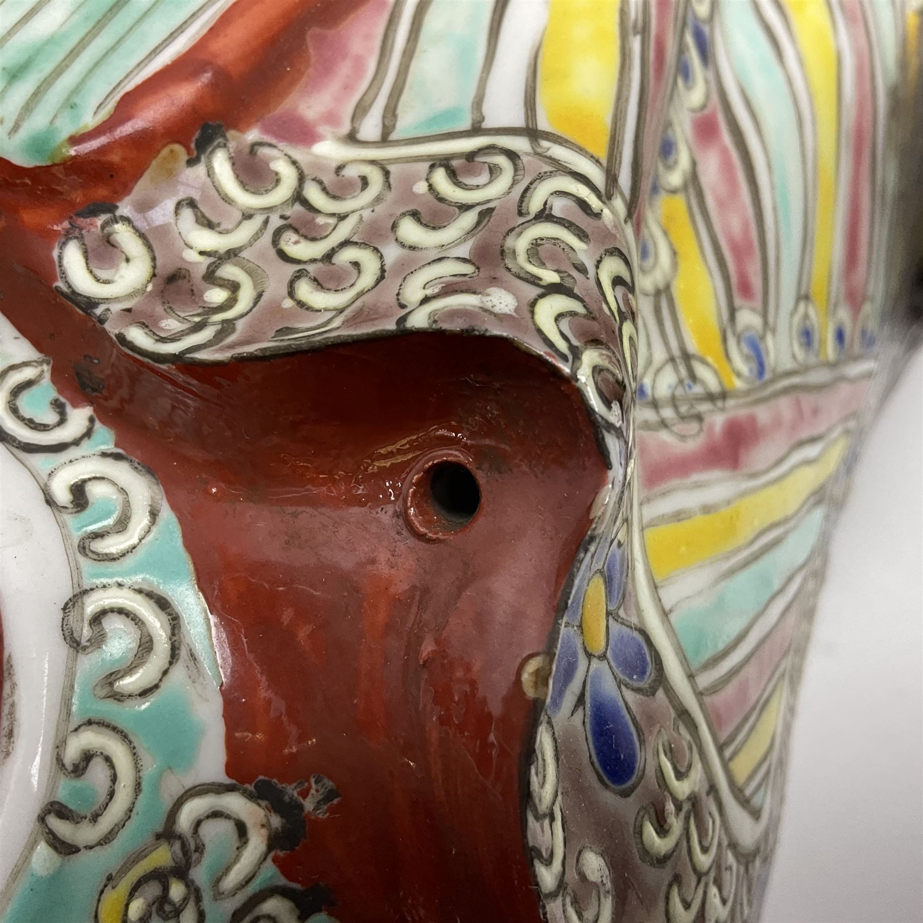 Chinese Republic Period porcelain figure, modelled as Shoulao, wearing elaborately enamelled robes decorated with peaches and flower heads, with impressed mark beneath, H55cm