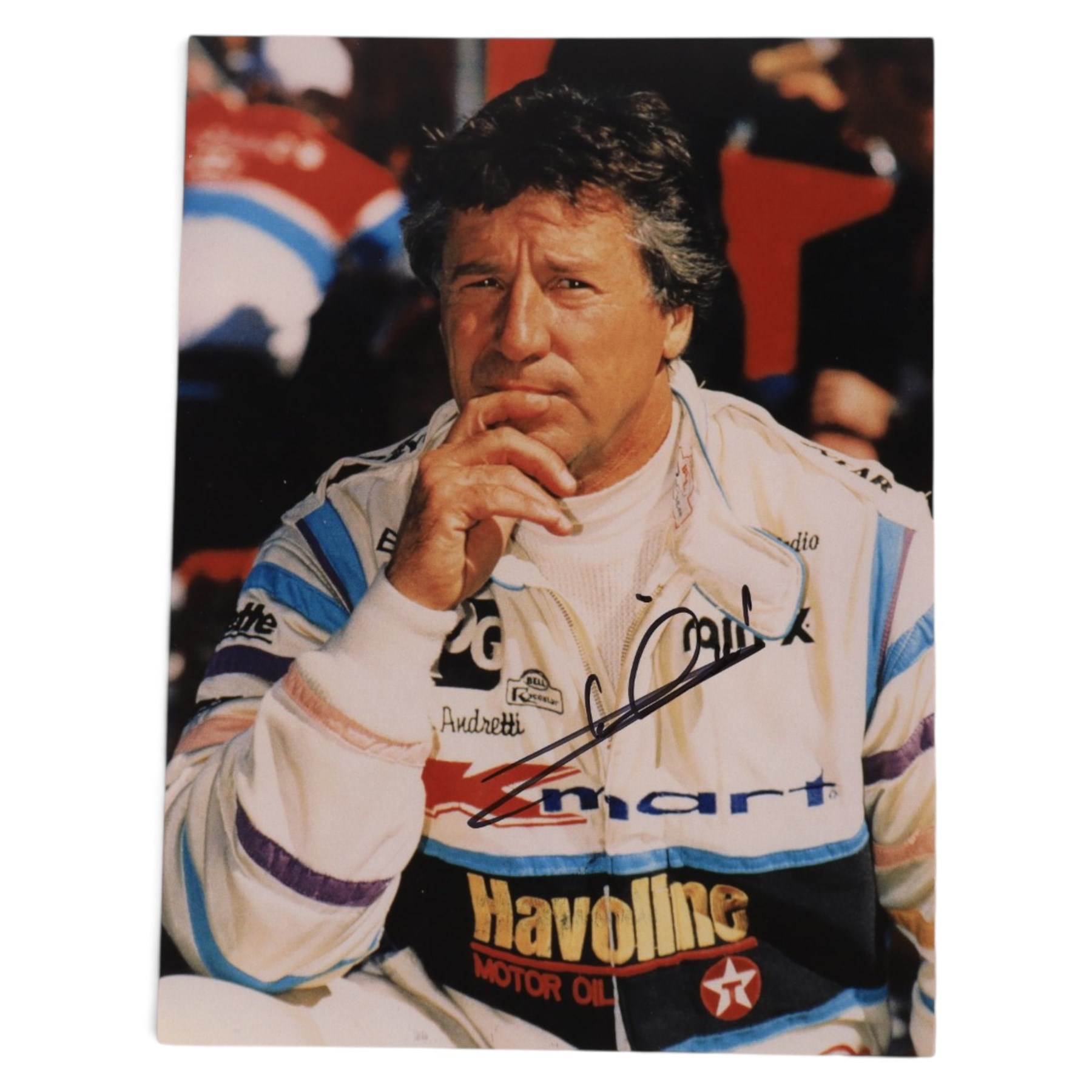 Signed Formula 1 memorabilia, including 1973 Milestones magazine signed to the front cover by Graham Hill and three signed photographs comprising Jackie Stewart, Jack Bradbury and Mario Andretti, with certificate of authenticity from Chaucer Auctions