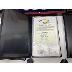 Single owner lifetime collection of mostly commemorative modern World coins with gold, silver and base metal examples, including two Queen Elizabeth II Bailiwick of Guernsey twenty-five pound gold coins 'The 1999 Royal Wedding' and '100th Anniversary of the End of the Victorian Era' 2001 each in 24 carat gold weighing 7.81 grams with certificates, silver coins commemorating the Millennium 2000 including Guyana sterling silver proof two-thousand dollars, Fiji sterling silver proof five dollars etc, silver coins from the Queen Elizabeth II Golden Jubilee Collection dated either 2002 or 2003 from Great Britain and the Commonwealth countries, United Kingdom commemorative crowns in card folders, The Royal Mint United Kingdom 1997 proof coin set in red folder without certificate etc