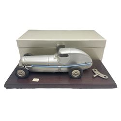 Marklin tin-plate clockwork Mercedes-Benz W25 racing car with driver in hinged cockpit model no.1096; fitted on mahogany base L33cm; in original metallic silver box with key