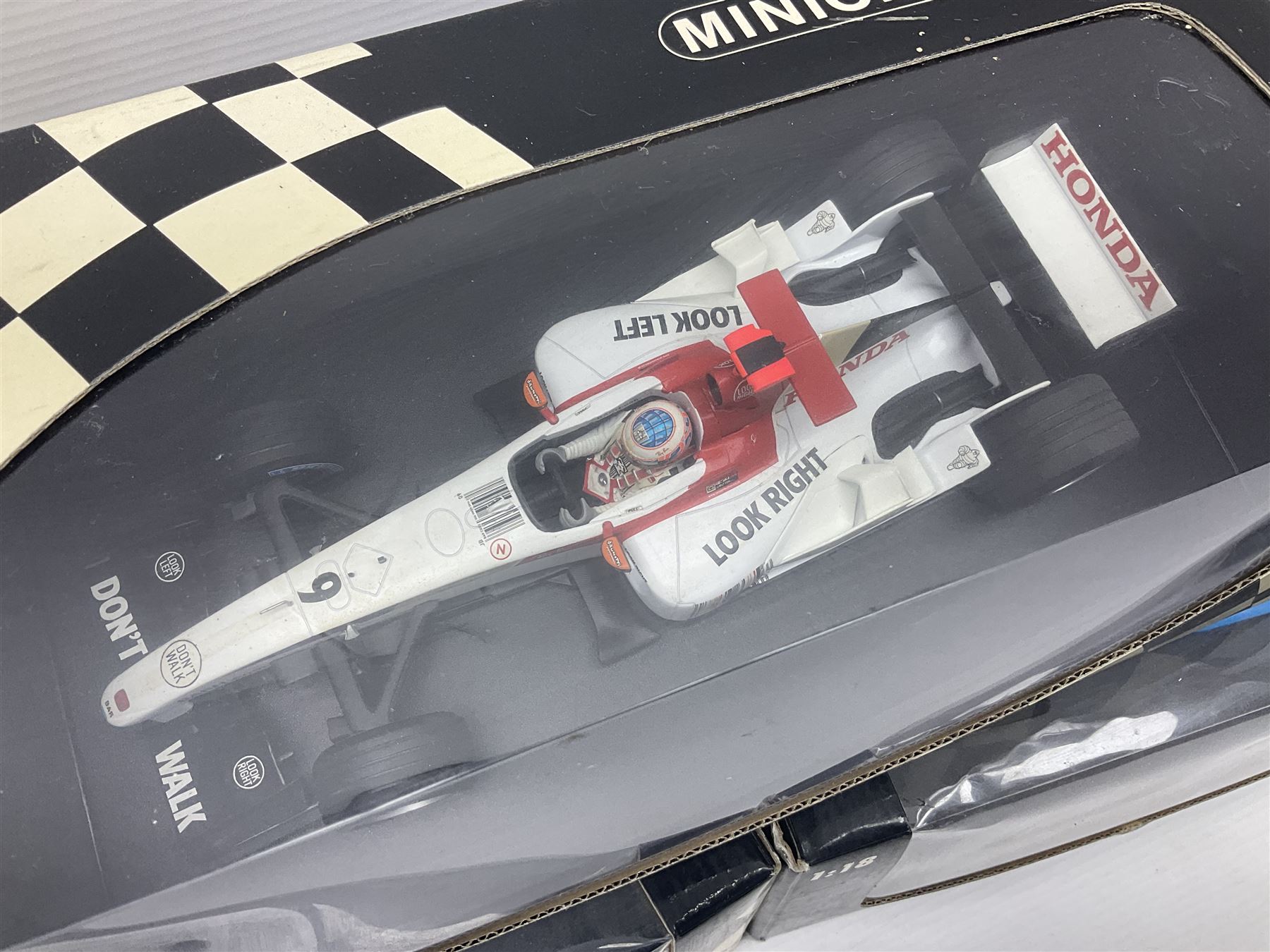 Three Minichamps 1:18 scale die-cast racing cars - B.A.R. Honda 006 J. Button; limited edition Benetton Renault Sport Showcar 2001 J. Button; and limited edition Benetton Renault Sport Showcar 2001 G. Fisichella; all boxed (3)