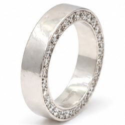 Platinum diamond wedding band, each side set with twenty-eight round brilliant cut diamond...