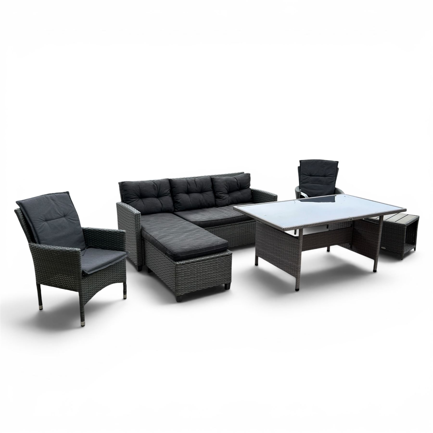 Jutlandia - Rattan garden furniture set with cushions, corner sofa, rectangular glass top table, side table, and two armchairs