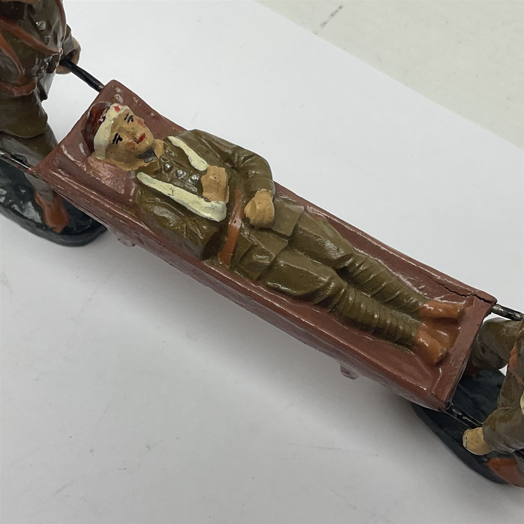 Eight Elastolin British soldiers and wartime figures, including nurse, injured soldier on stretcher, soldier with dog, etc, tallest 11cm