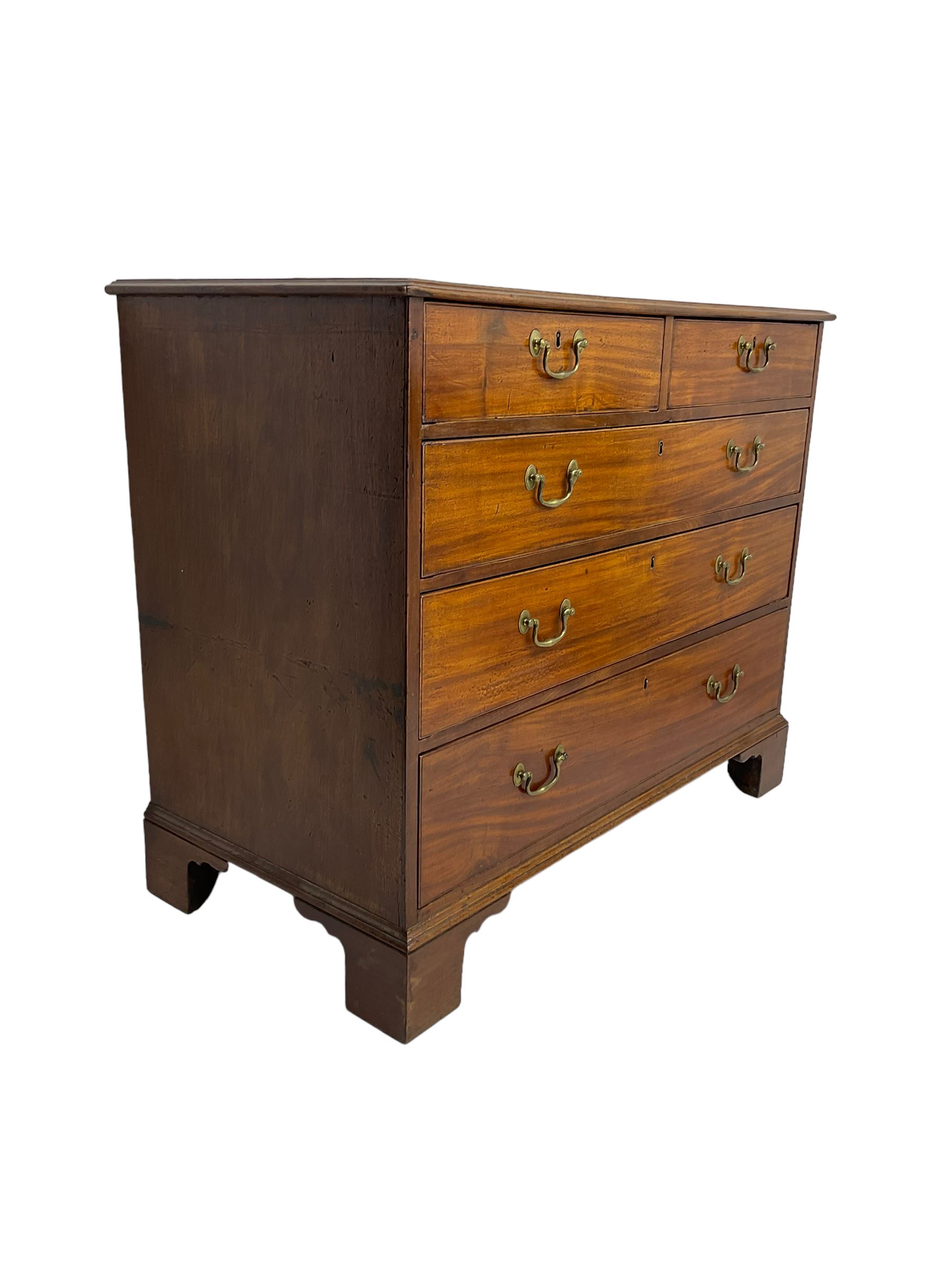 George III mahogany straight-front chest, fitted with two short over three long drawers, on bracket feet