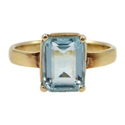 Gold single stone emerald cut aquamarine ring, stamped 18K