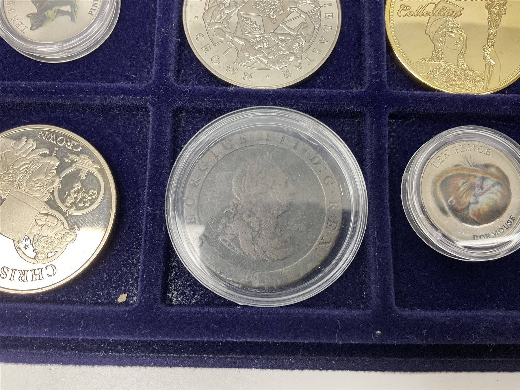 Commemorative, fantasy and other coinage, including George II 1754 farthing, George III 1773 farthing, cartwheel penny and cartwheel two pence, Queen Victoria Canada 1886 twenty five cents, various commemorative crowns etc, housed in three blue coin trays