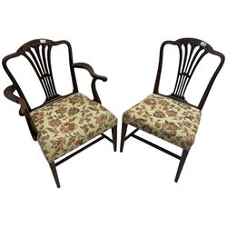 George III Hepplewhite design mahogany elbow chair and matching side chair, cresting rail carved with bellflowers over pierced and flared splat, seats upholstered in floral patterned fabric, raised on square tapering supports united by stretchers