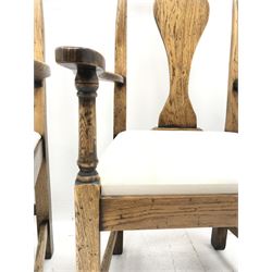 Set eight Georgian style distressed light oak chairs with upholstered removable seat pads, two carver chairs and six side chairs, W61cm & W48cm