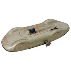 Three tinplate wind up/clockwork toys, to include a Japanese Cragstan Snapping Alligator, boxed, a Japanese Noguchi polkadot robot and an Audi Auto Union Streamline car, together with a boxed Wind Up Star Warrior