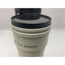 Minolta Dynax 7 camera body, serial number 93101009, Minolta 'AF APO Tele 300mm 1:4 (32)' lens serial no 32501041, in case and other camera equipment 