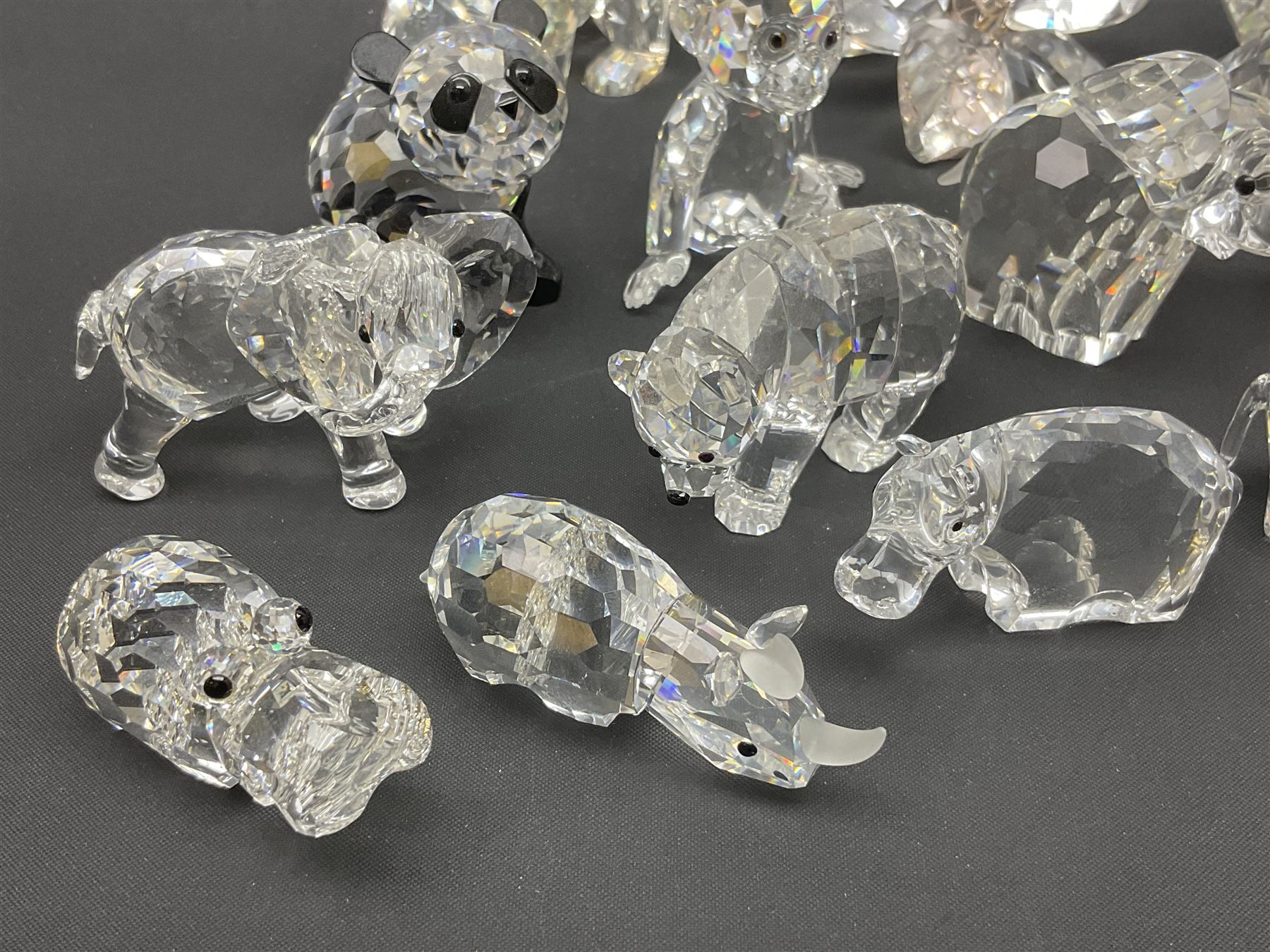 Twenty nine Swarovski Crystal animals, to include koala and baby, in frosted tree branch, elephants, polar bears, squirrel, monkeys, panda, unicorn and snails, etc 