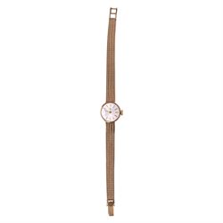 Garrard ladies 9ct gold manual wind presentation wristwatch, on integral 9ct gold bracelet...