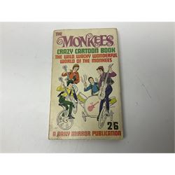 Monkees memorabilia - 'Monkees Monthly' magazine almost complete run from No.1 Feb 67 to No.31 Aug 69 (lacking nos.29 and 32); the cover of No.1 signed by all four members of the group during their 1997 Reunion Tour; quantity of A&BC bubble gum cards; programme for their only UK live performance in 1967 at Empire Pool Wembley; and other related late 1960s music magazines/paperback book