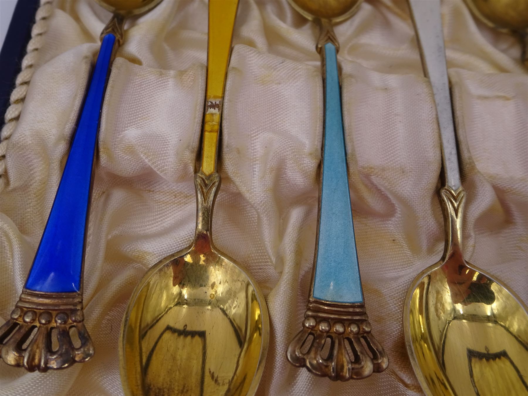 Set of six Danish silver-gilt harlequin enamel demitasse spoons with crown finials, by Egon Lauridsen, stamped ELA Denmark Sterling 925S, in fitted case