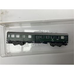 Fleischmann ‘N’ gauge ‘Piccolo’ - sixteen carriages, wagons and cars comprising nos. 8051, 8052, 8055, 8064, 8119K, 8127, 8128, 8129, 8202, 8211, 8224, 8240, 8281, 8301, 8500, 9372; along with Minitrix N503 Shock Van and 13576 6 ton Mineral Wagon; boxed and loose (18) 