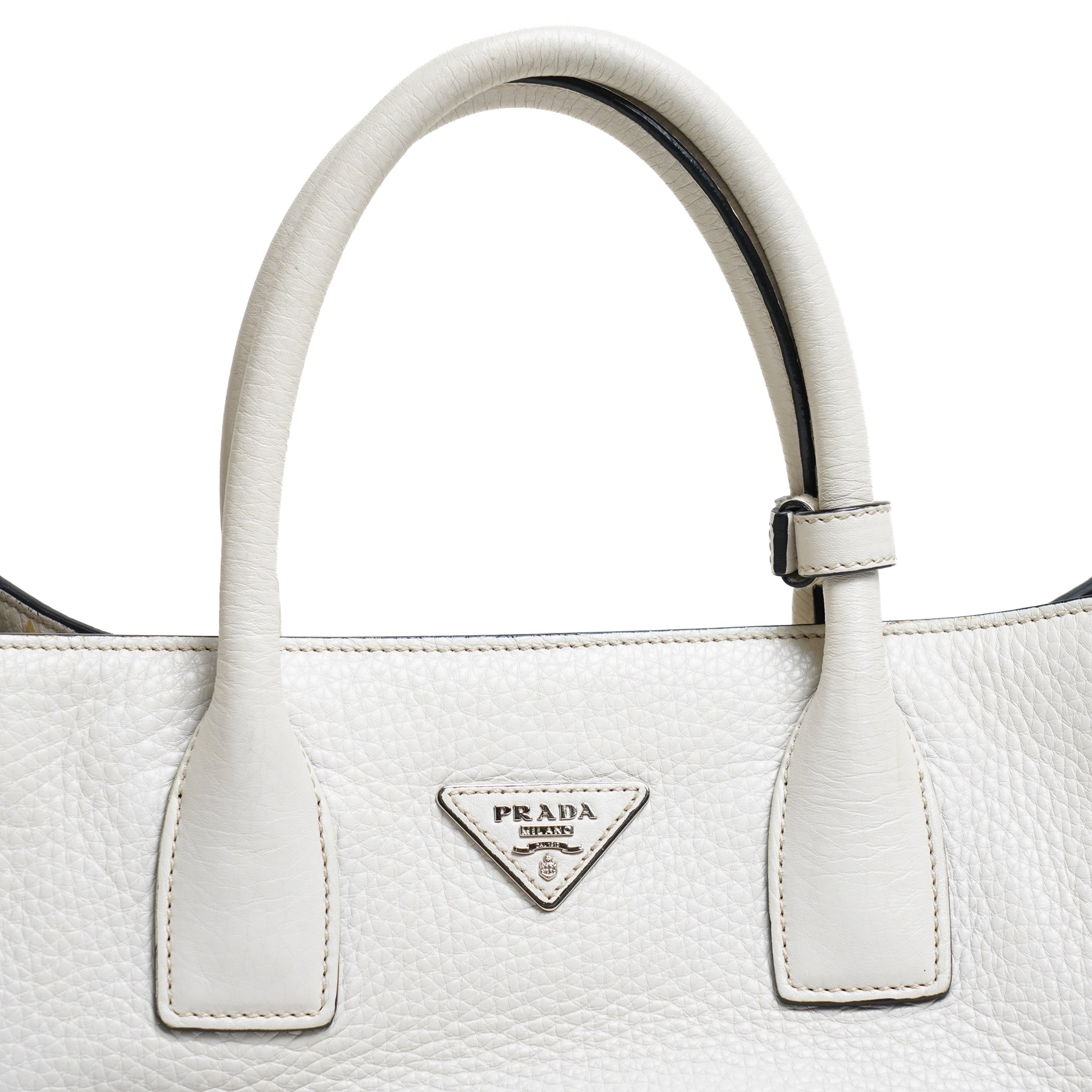 Prada - Vitello Daino shopping tote in Talco pebbled calf leather with contrasting black piping, the softly structured body with twin rolled handles, detachable and adjustable shoulder strap, zip fastening, silver-tone hardware and triangular Prada Milano logo plaque, with original product tag, authenticity card and dust bag