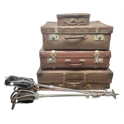 Three shooting sticks, together with four vintage leather brown suitcases of various sizes, largest suitcase H40cm L65cm 