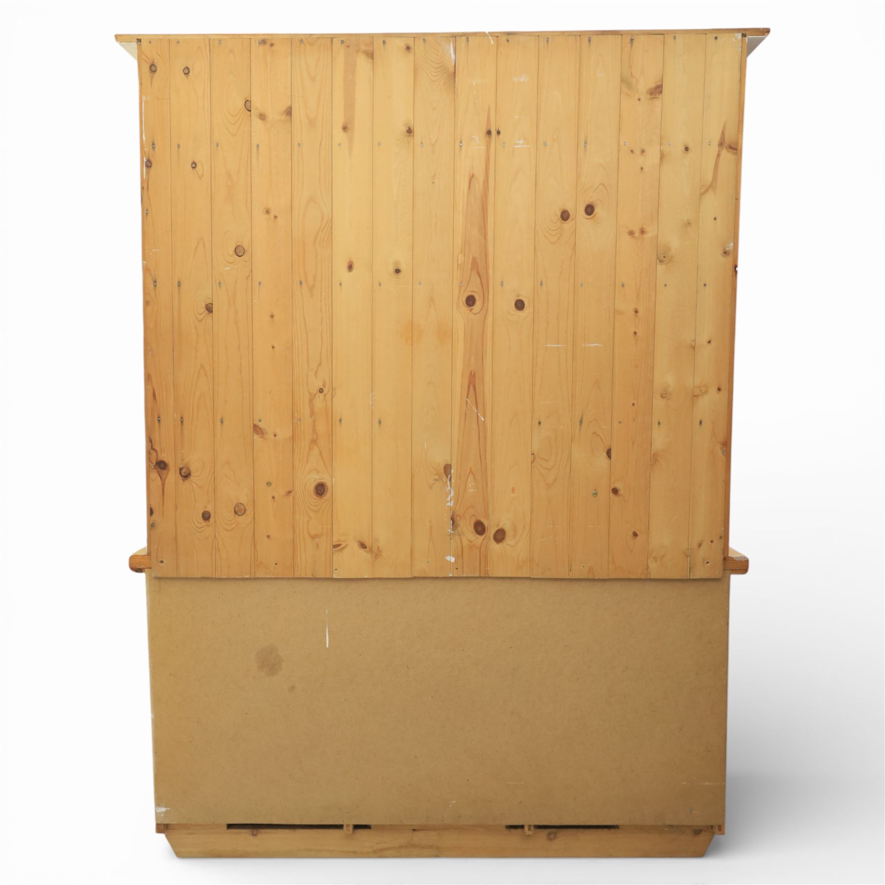 Late 20th century pine and white painted dresser, the upper section with three shelves and boarded back, upon a base with three drawers with knob handles and three panelled cupboard doors, on a raised sled base