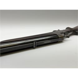 Rare Henry Pieper Liege seven-chambered solid barrel 297/30 calibre rim-fire volley gun with six barrels around a central seventh barrel drilled for simultaneous fire, built on a Remington type rolling block action, blued 62cm barrel with raised rib and twin rear leaf sights, case hardened action complete with loading plate for seven cartridges, walnut stock with chequered pistol grip and fore-end and inset 'silver' cartouche with two Chinese type characters, no.256PLN, L109cm overall