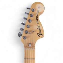 Fender Stratocaster electric guitar, serial no. P093223 made in Japan c.1993, with cream body, white scratch plate, maple neck, three pickups, three control dials and five way selector switch, in a black Fender USA hardcase, guitar L99cm