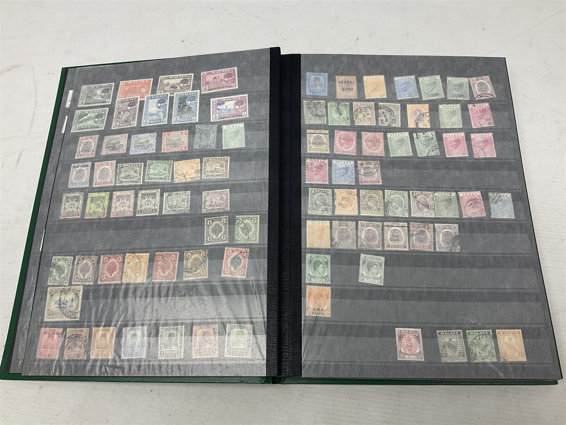 Stamps including St Helena, Fiji, Southern Rhodesia, Malaya, Bermuda, Queen Victoria and later Ceylon, various Universal Postal Union 1949 etc, housed in six albums/folders