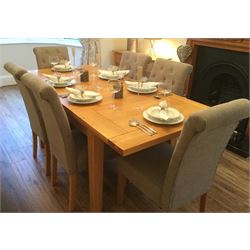 Light oak extending dining table, two leaves, square tapering supports and six Very roll top high back chairs upholstered in grey fabric 