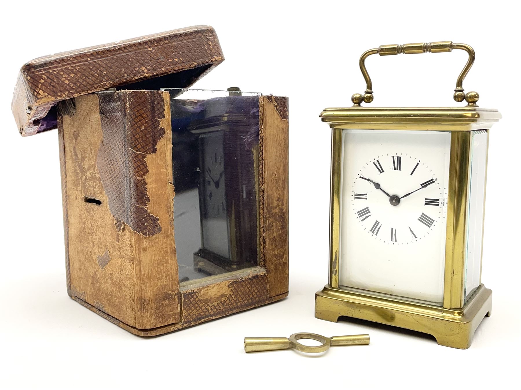 Early 20th century brass carriage clock time piece, white enamel Roman dial, single train driven movement 