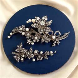 19th century gold and silver diamond and pearl en tremblant detachable brooch, the flower tremblant with a principal old cut diamond of approx 1.90 carat, the petals and stamen set with old cut and rose cut diamonds, total diamond weight approx 9.10 carat, to a foliate spray set set with further rose cut diamond and white / pink / cream pearls and ribbon tie