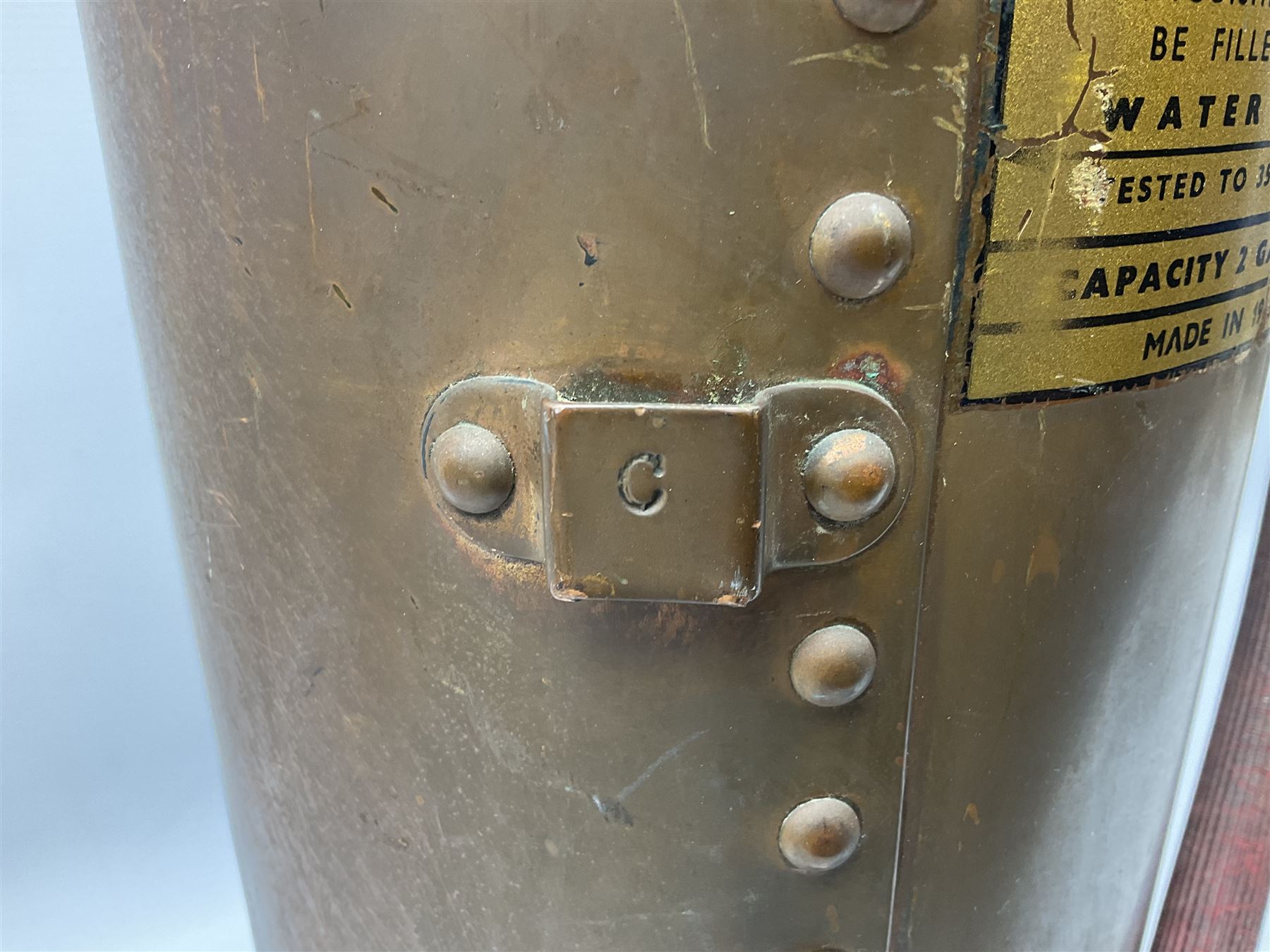 Large copper ‘Waterloo’ fire extinguisher by Read and Campbell Ltd and another Safex example 

