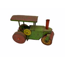 1991 Atlantic Bears limited edition black teddy bear, the revolving head with applied eyes, vertically stitched nose and jointed limbs with growler mechanism No.84/100 H53cm; together with clockwork tin-plate road roller possibly by Mettoy and a push-along painted scratch built wooden locomotive (3)