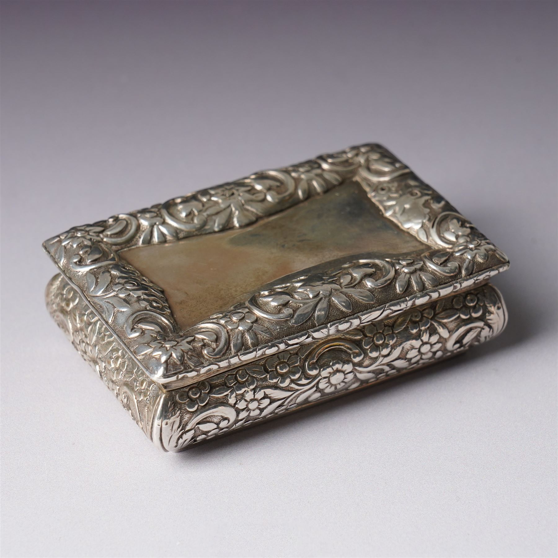 William IV silver snuff box with floral border, gilded interior 8cm x 5.5cm Birmingham 1831 Maker Nathaniel Mills