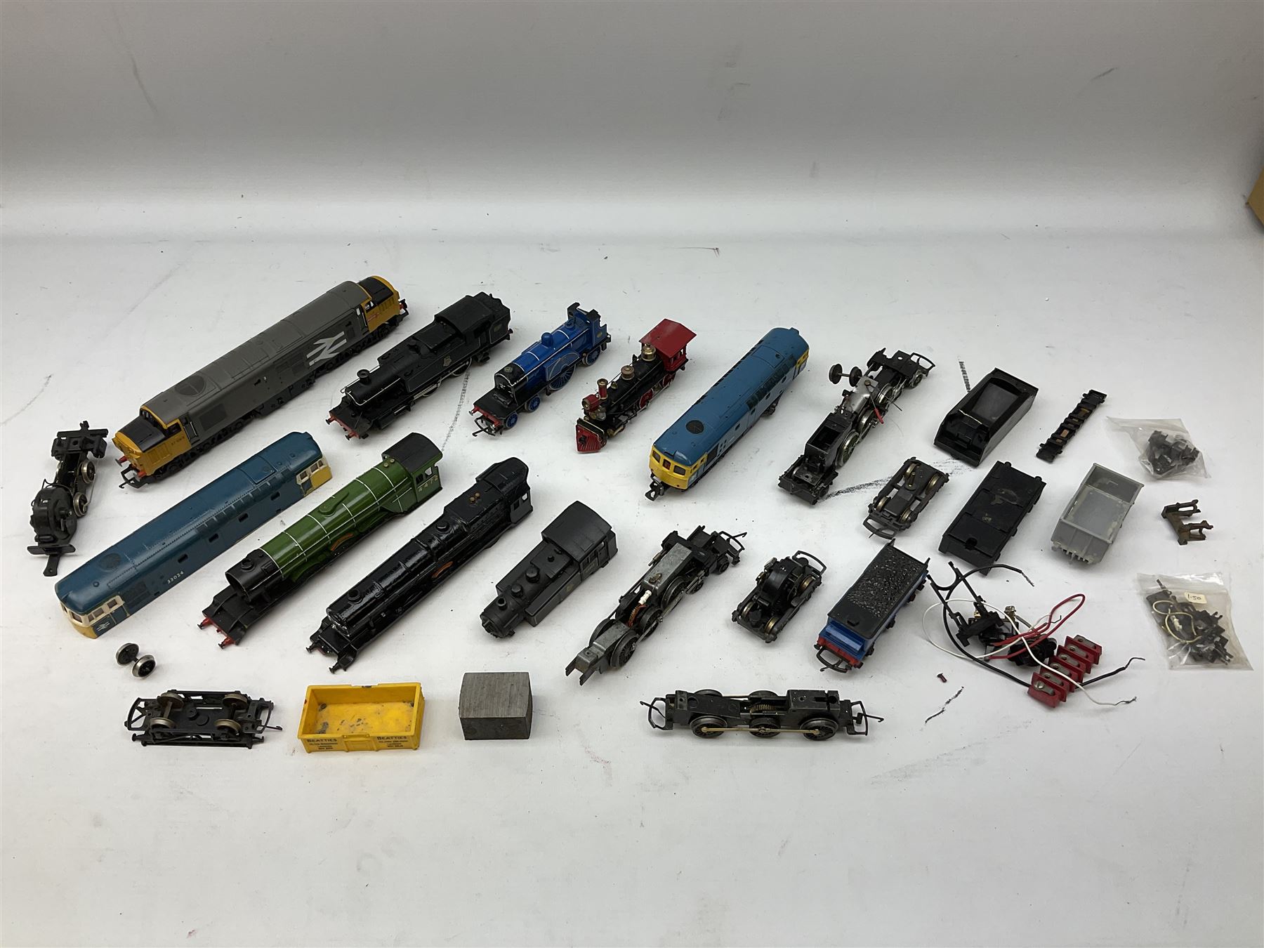 '00' gauge - Tri-ang 'Caledonian Single' Class 4-2-2 locomotive and tender; Hornby Class 37 Diesel (English Electric Type 3) locomotive No.37063; Airfix Class 61XX 2-6-2 Prairie tank locomotive No.6167; Pocher Italy American style 4-4-0 locomotive 'Reno'; and a quantity of part locomotives, spare parts etc; all unboxed