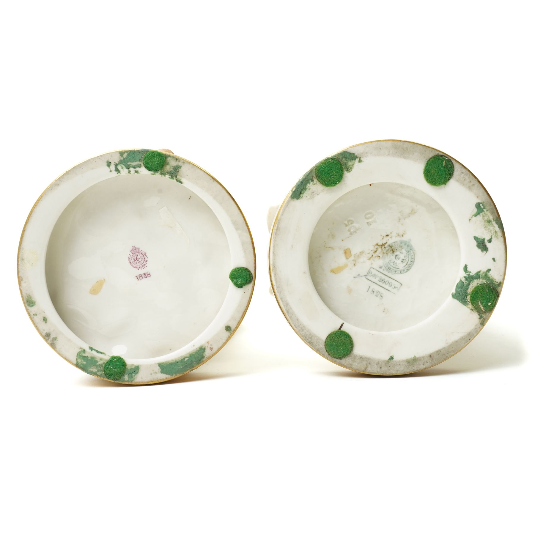 Pair of Royal Worcester figures of female musicians modelled by James Hadley, one with cymbals, decorated in gilt and on circular bases H33cm  