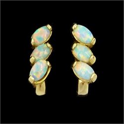 Pair of 14ct gold three stone opal earrings, stamped 585