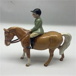 Beswick Boy on Palomino Pony no 1500 and Girl on Skewbald Pony no 1499, both with printed mark beneath 