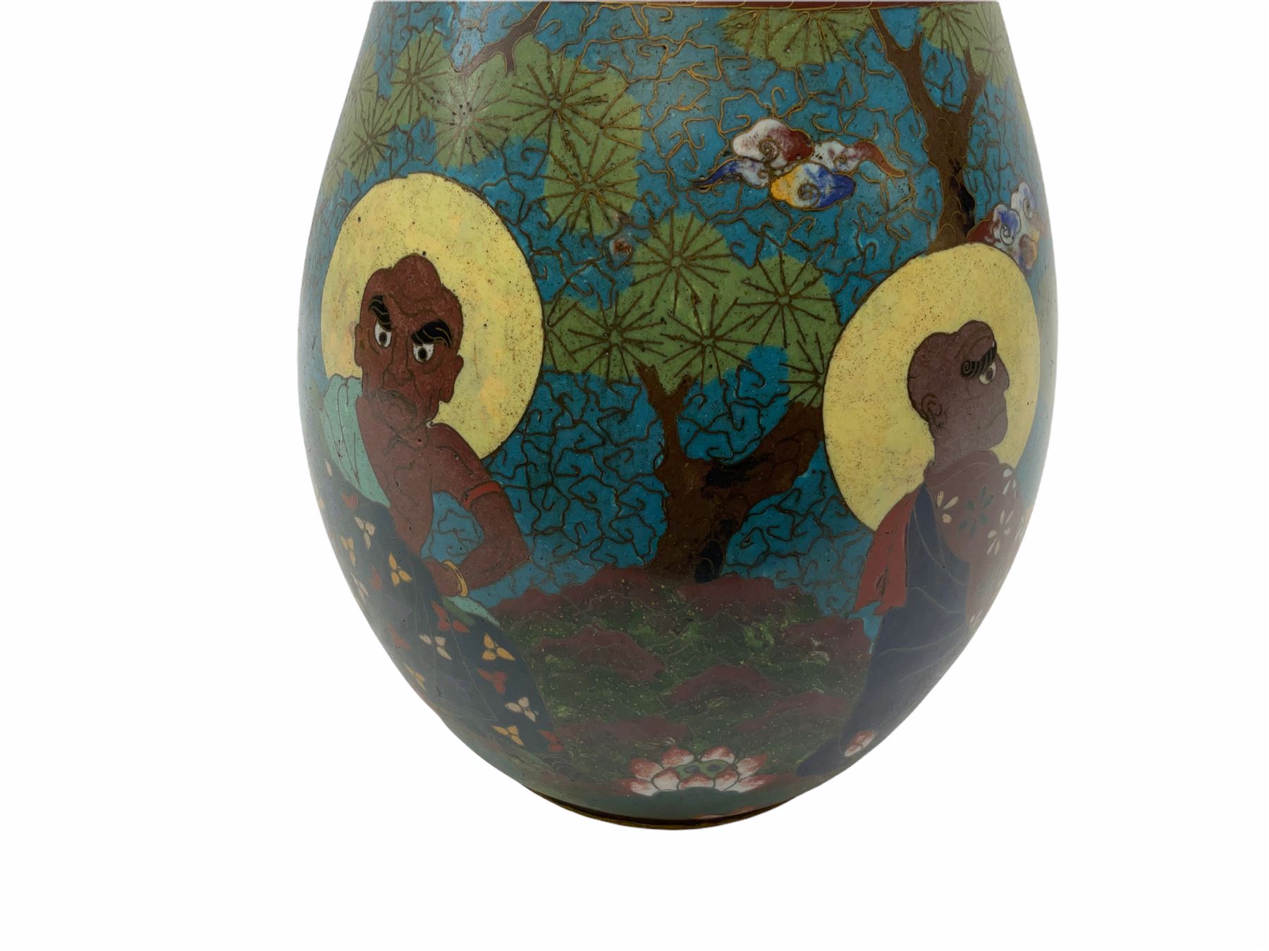 Japanese Cloisonne vase, Meiji/Taisho period, decorated with five haloed figures, possibly the Lucky Gods or Monks, in a landscape detailed with pine trees, lotus flowers and auspicious clouds, beneath a neck with band of fronds, with apocryphal Ming mark beneath, H31cm