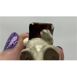 Victorian Wedgwood blue jasperware jardiniere H16.5cm; Victorian copper lustre jug; James Kent art deco style green glazed jug; and Beswick figure of a singing cat (4)