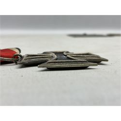 WW2 German Iron Cross 2nd Class with ribbon, ring stamped 44; and original issue packet; together with a copy of a WW2 Iron Cross