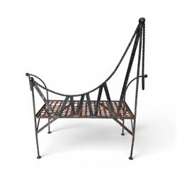 Victorian design wrought iron garden bench, with asymmetrical rope-twist frame, arched back and sides over out-swept arm terminals with ball finials, flanking a lattice seat, in antique black-painted weathered finish