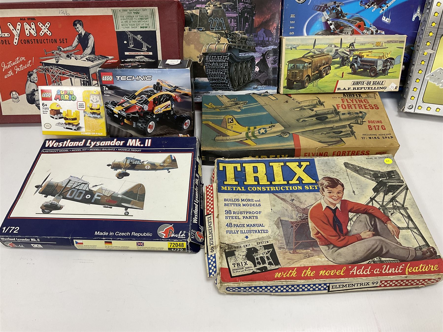 Nineteen assorted construction kits by Lego, Trix, Airfix, Tamiya, Paula, Steel Tec etc; all boxed (19)