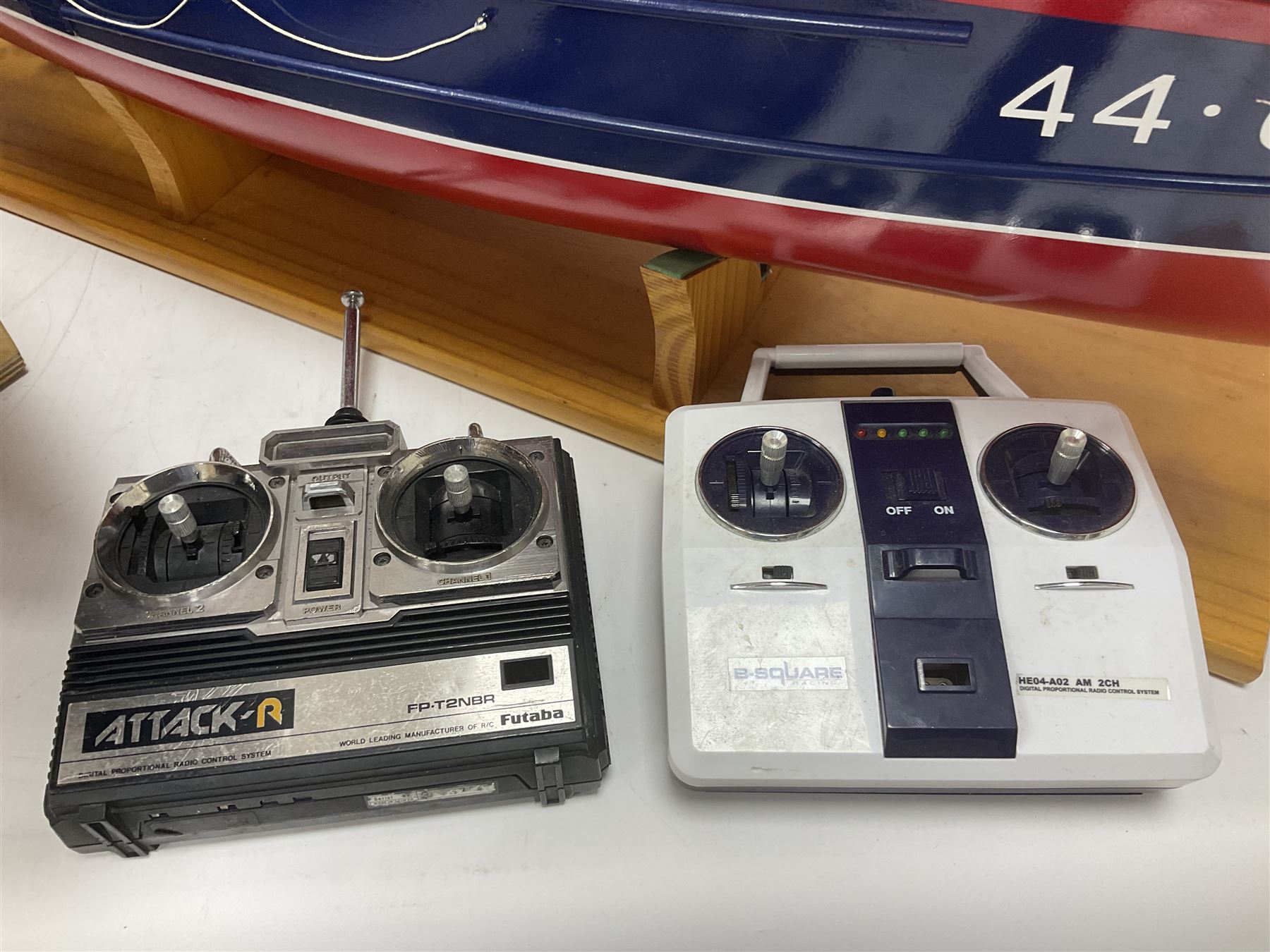 Two remote controlled kit-built plastic model boats - RNLB Sheerness Lifeboat Helen Turnbull L92cm and 'Conserver' Grangemouth L76cm; each on wooden stand; together with three remote control units
