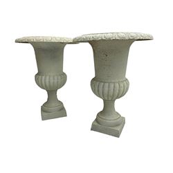 Pair of Victorian design white painted cast iron campana shaped garden urns, egg and dart rim over a gadrooned underbelly, tapering column on square plinth base - THIS LOT IS TO BE COLLECTED BY APPOINTMENT FROM DUGGLEBY STORAGE, GREAT HILL, EASTFIELD, SCARBOROUGH, YO11 3TX