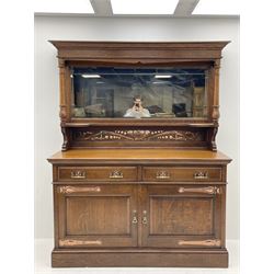 Arts and Crafts period oak mirror back dresser, projecting cornice above rectangular bevelled mirror and shelf, two turned supports, inset copper panel with embossed decoration, rectangular moulded top over two drawers and two panelled cupboard, moulded plinth base, brass and copper strappings and handles 