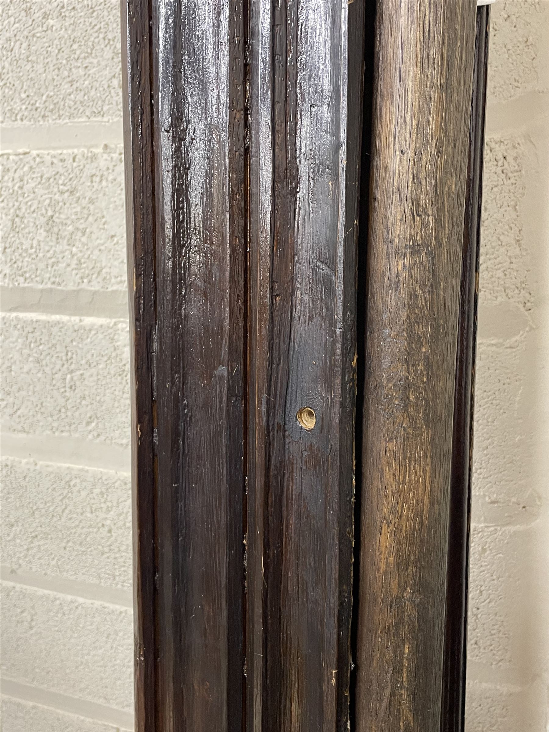 17th century style oak 4' four poster bed, high panelled back with projecting canopy cornice and panelled roof, turned posts with panelled front