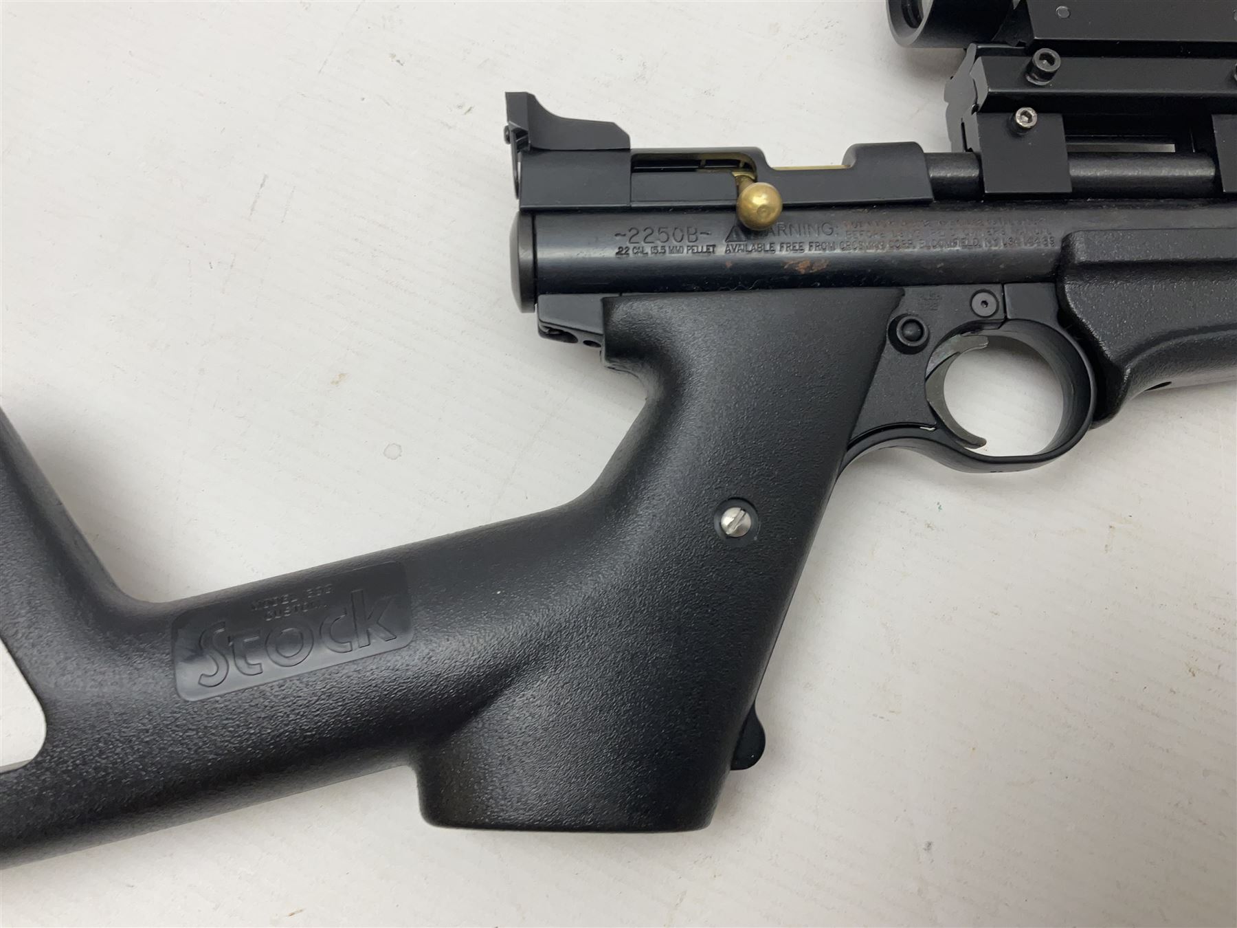 Crosman Model 2250B .22 cal. CO2 rifle, with PAO red dot sight and skeleton stock, serial no.221B76447, L77.5cm overall  NB: AGE RESTRICTIONS APPLY TO THE PURCHASE OF AIR WEAPONS.
